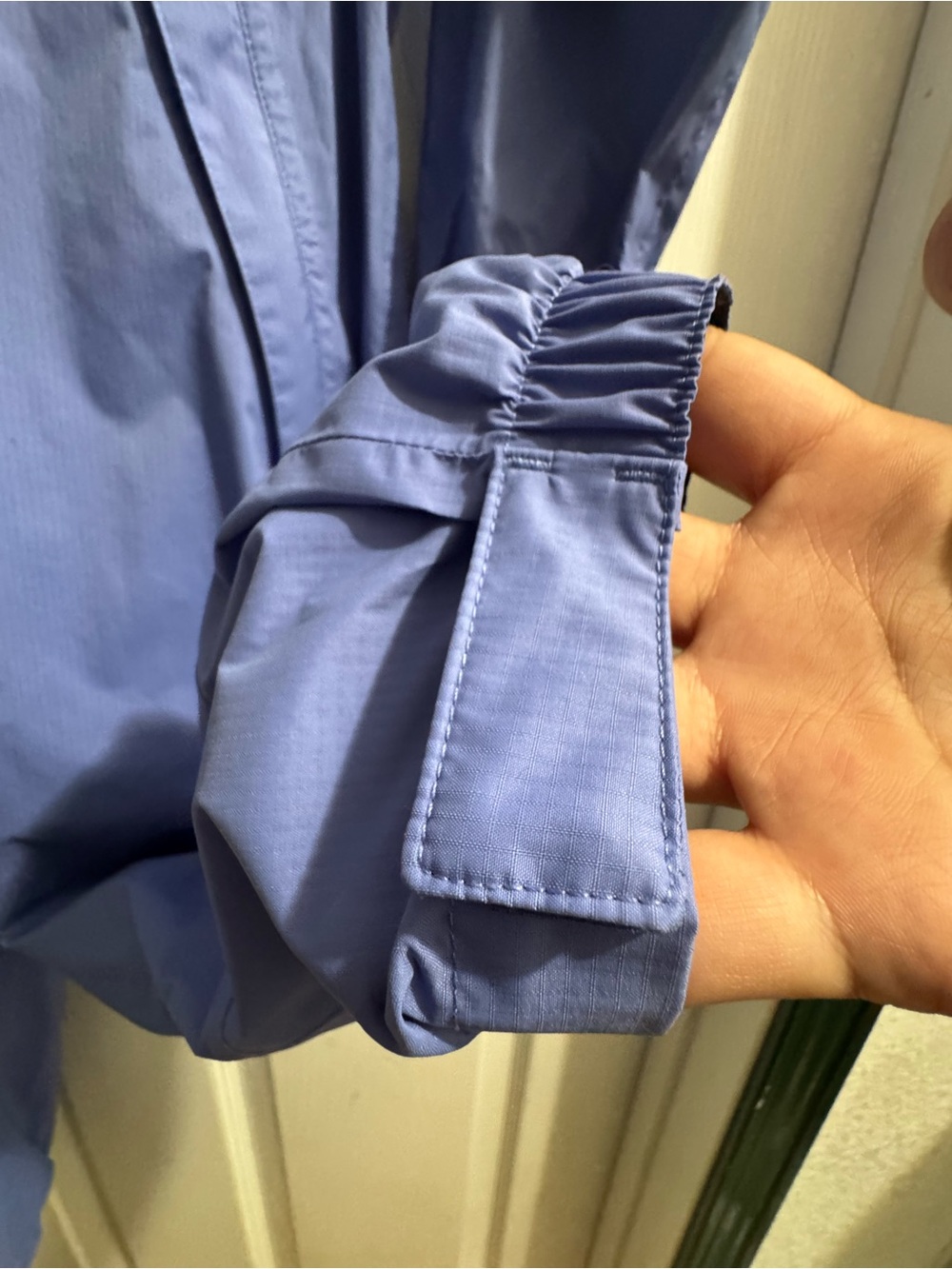 REI Blue Kids' rain Jacket onesie - Picture 4 of 8